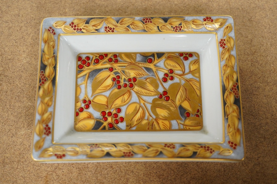 A Patek Philippe pin tray and another by Versace, largest 12cm. Condition - good